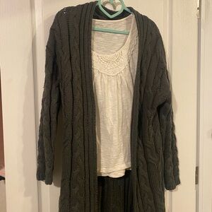 Cozy Cable Knit Cardigan says size small
, it’s a medium to me . Thick warm